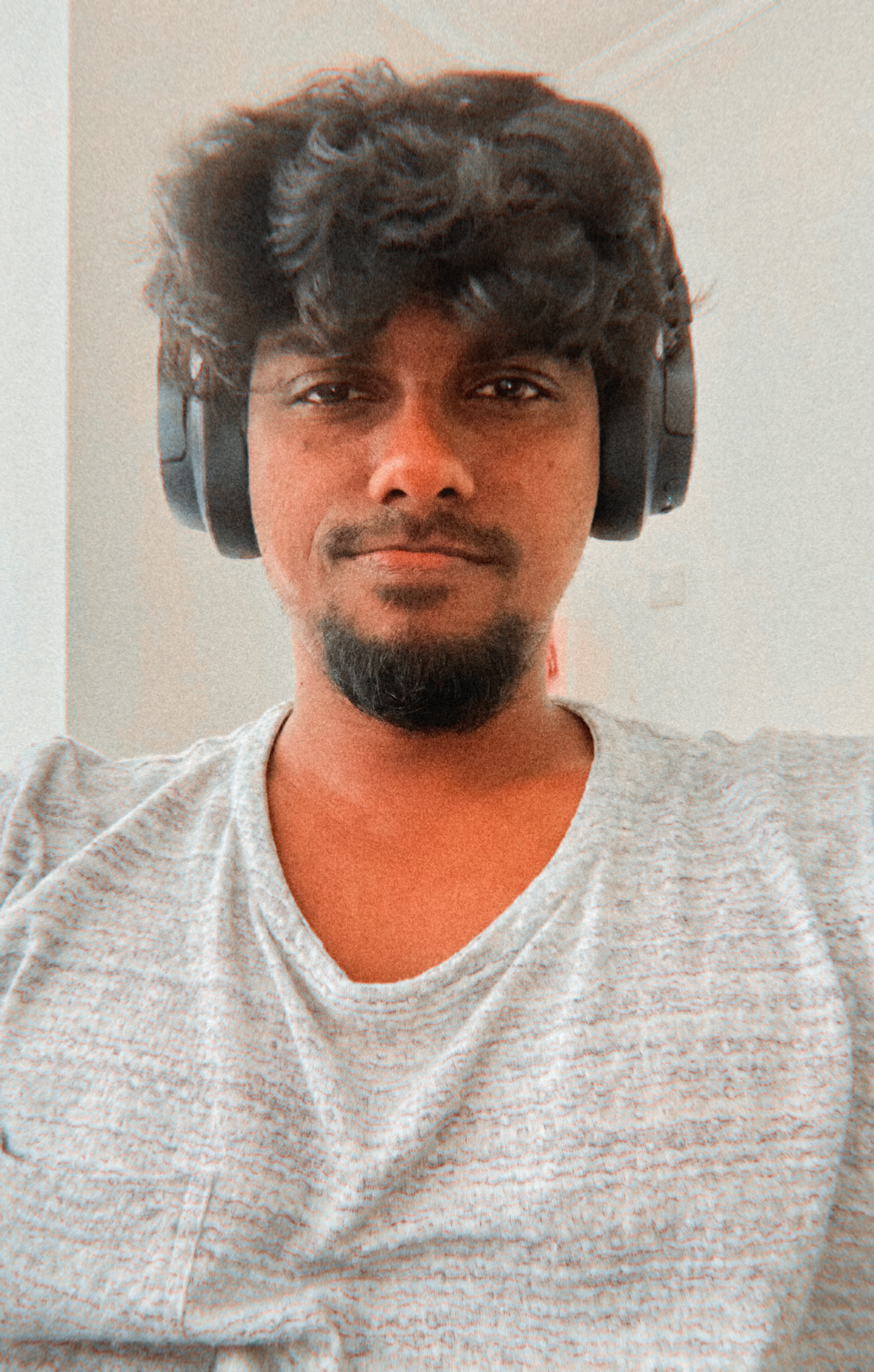 Person working on laptop with plants